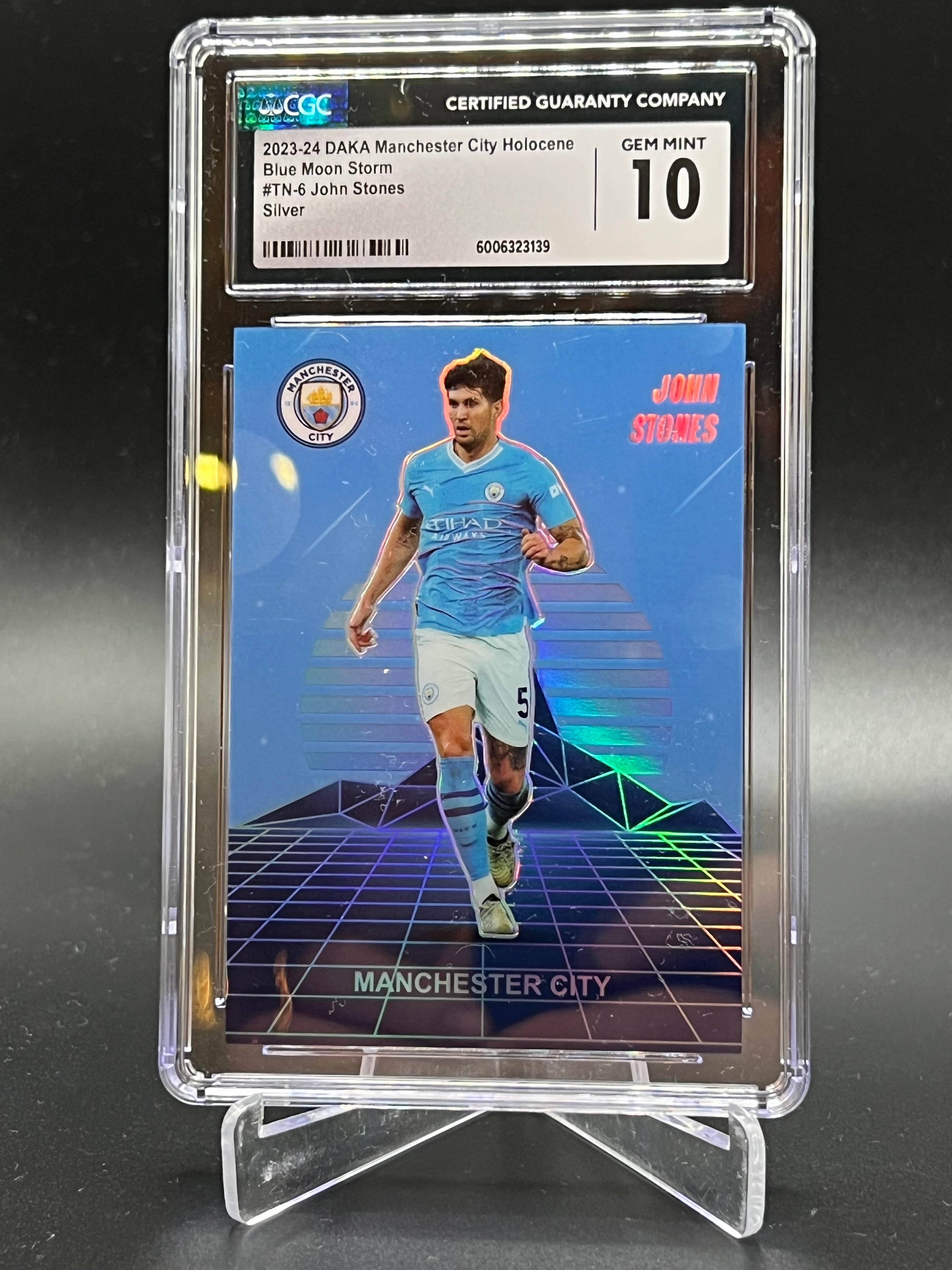 John Stones /20 CGC 10 Gem Mint 2023-2024 DAKA Manchester City Holocene Blue Moon Storm